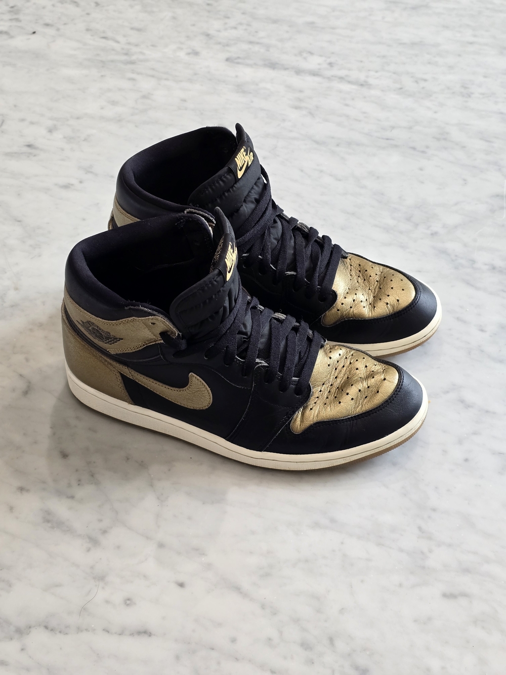 Nike Air Jordan 1 High Gold & Black Sneakers